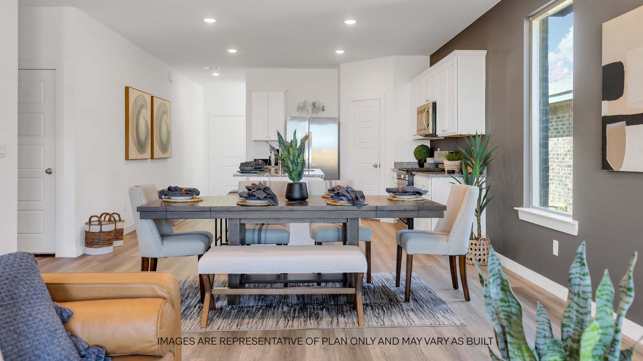 Open concept kitchen, living, family, and dining room space