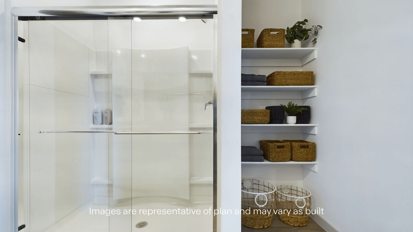 Primary bathroom with luxurious shower and built in storage