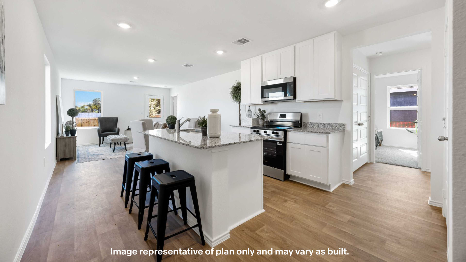 Open concept kitchen, living, family, and dining room space