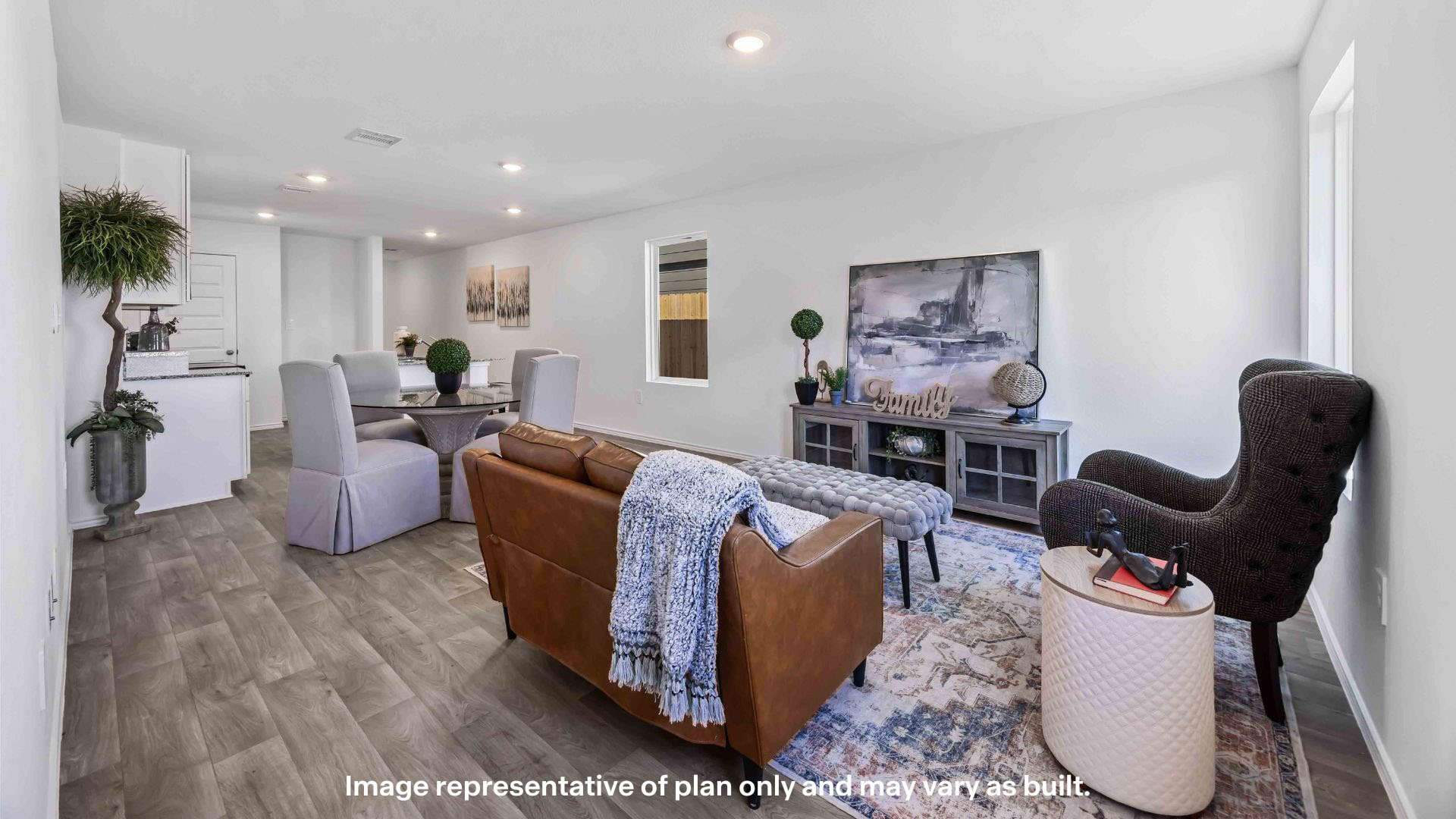 Open concept kitchen, living, family, and dining room space