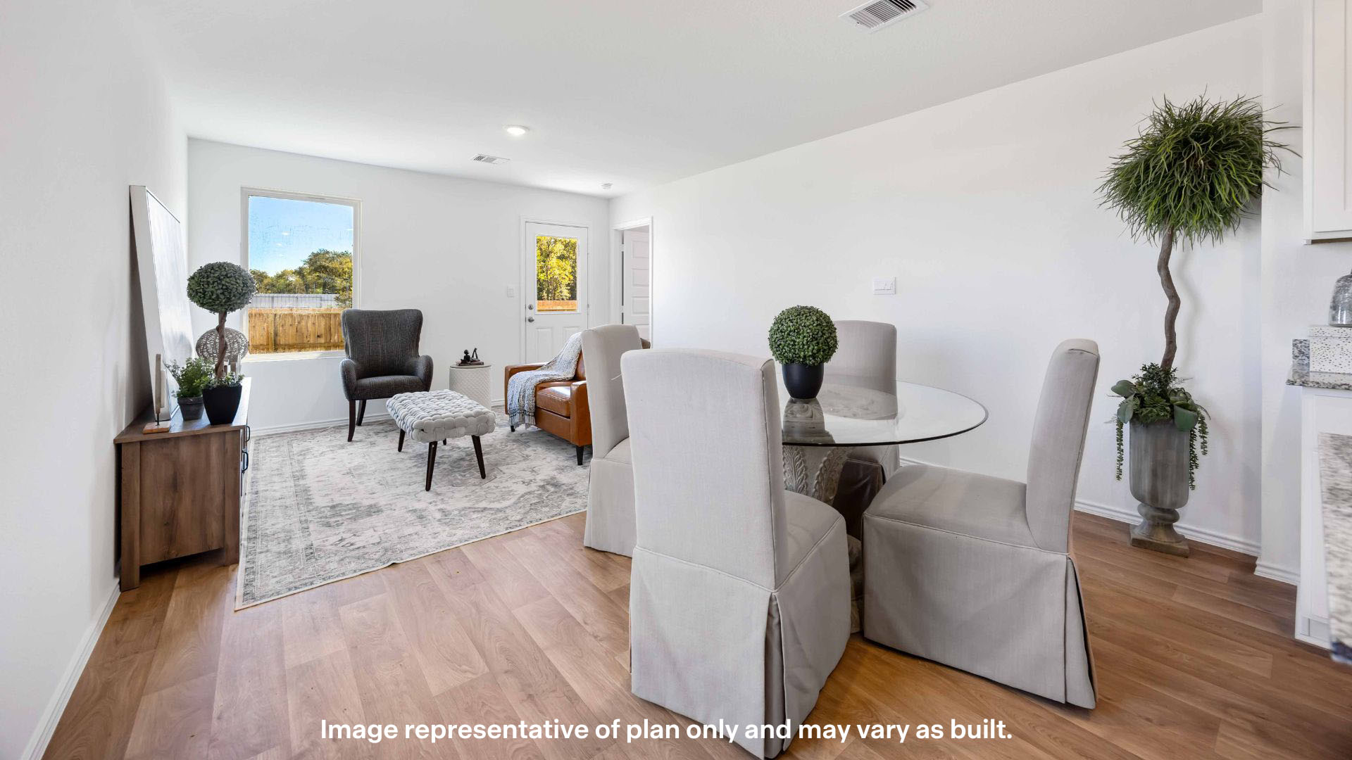 Open concept kitchen, living, family, and dining room space
