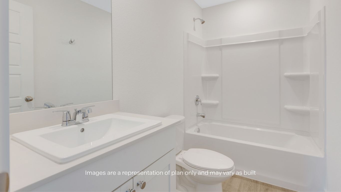 Guest bathroom with built in vanity and combination bathtub shower