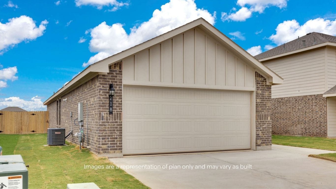 Side view of single story timeless brick home
