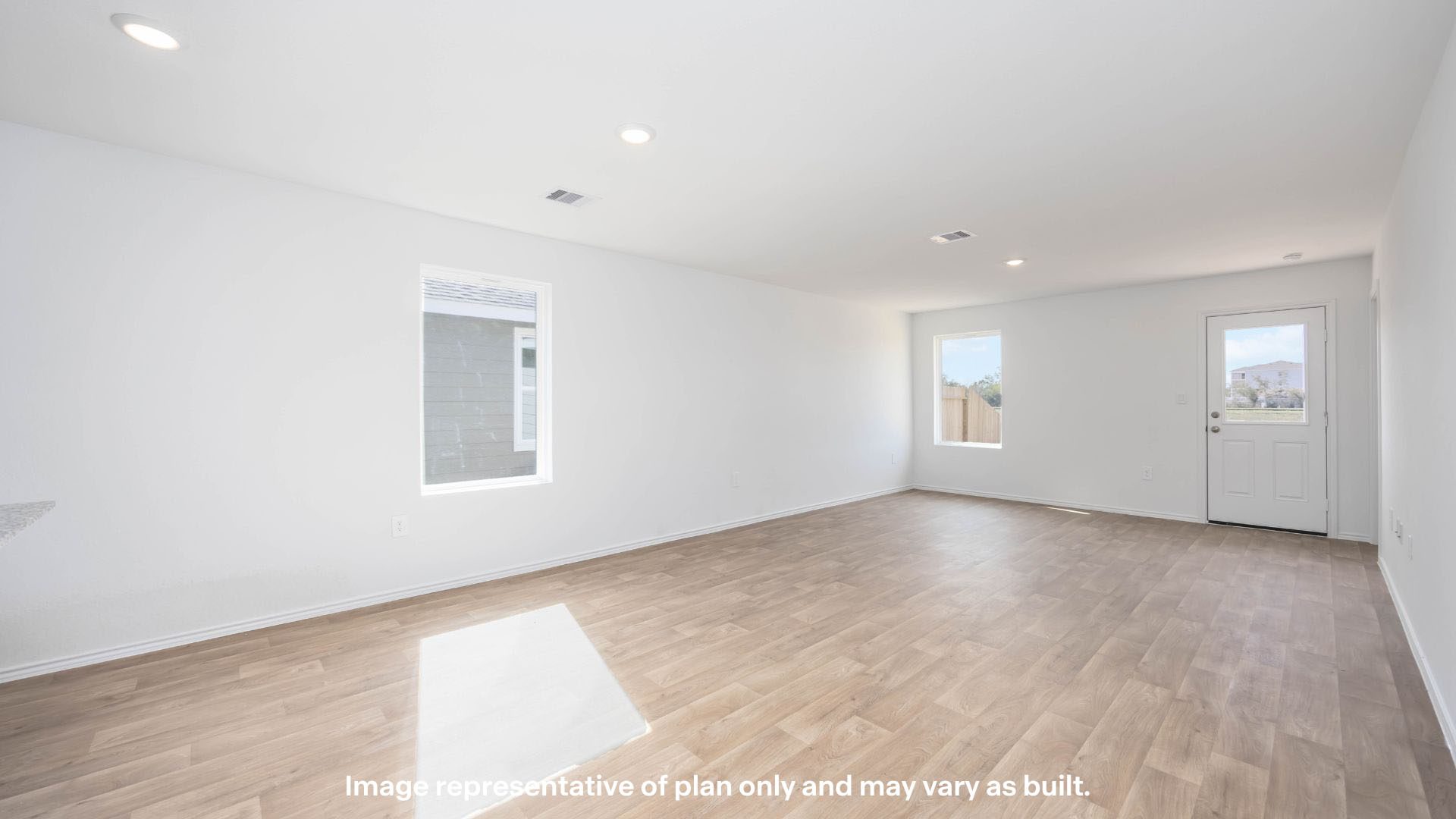 Open living and family room area with ample natural light