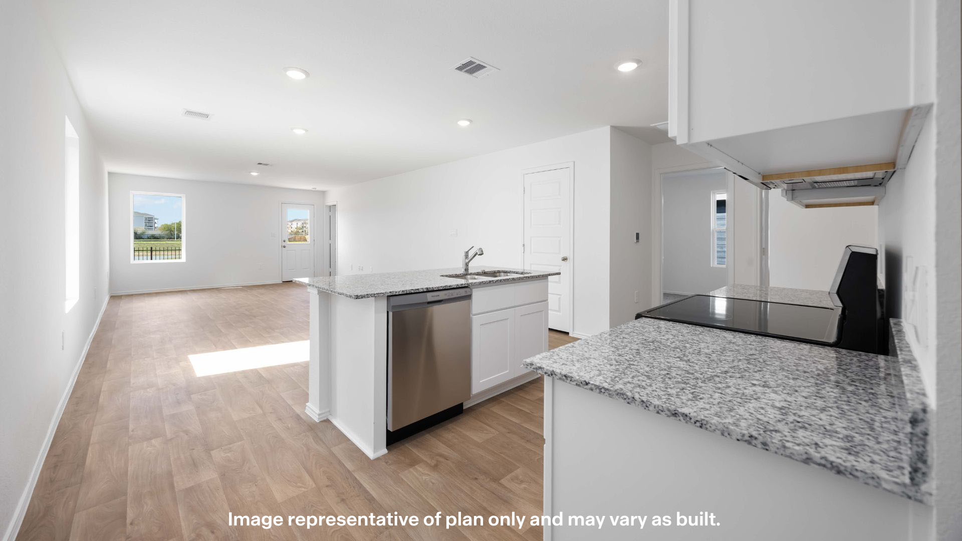 Open concept kitchen, living, family, and dining room space