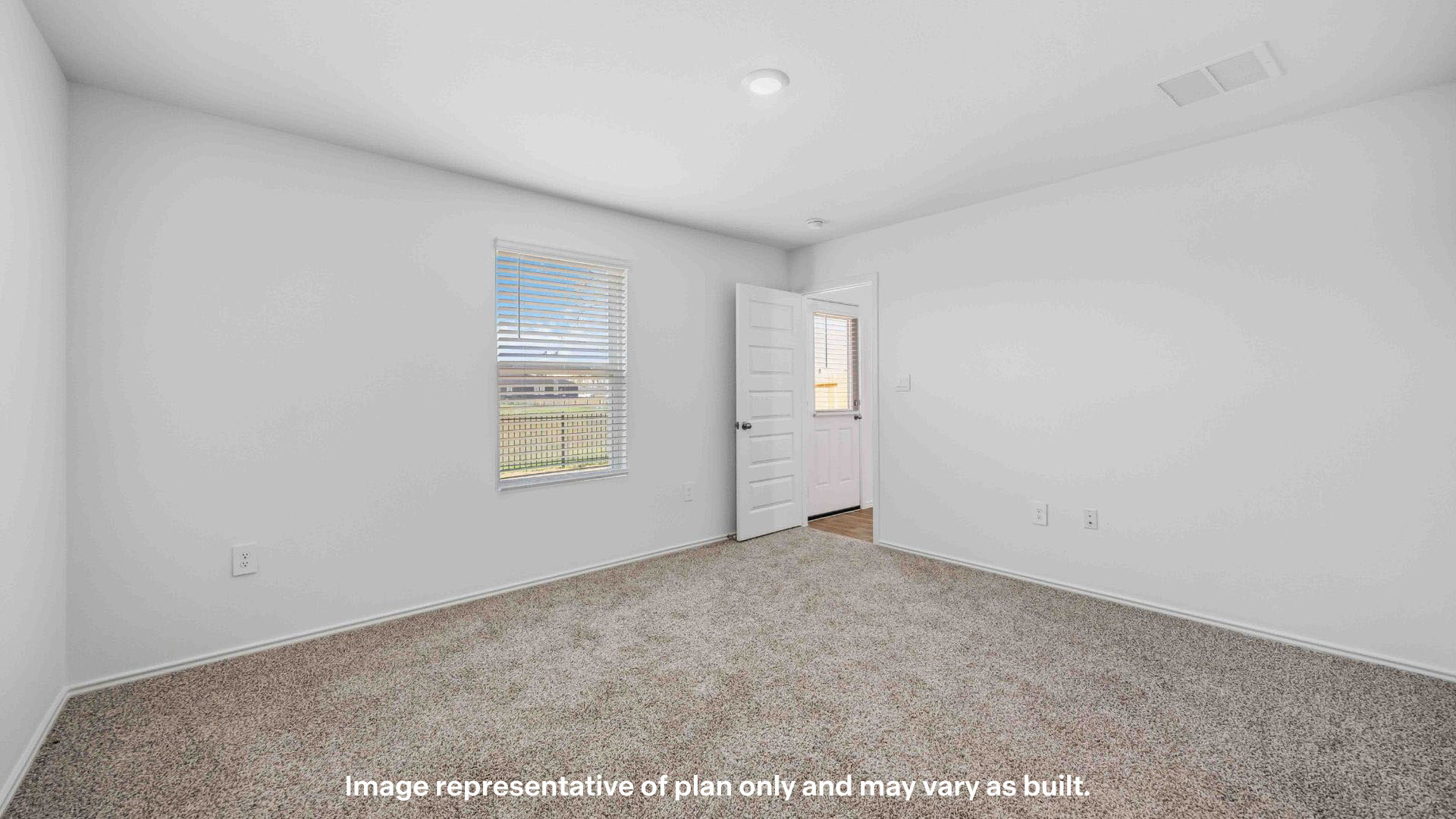 Primary bedroom with ample light and private bathroom and walk in closet
