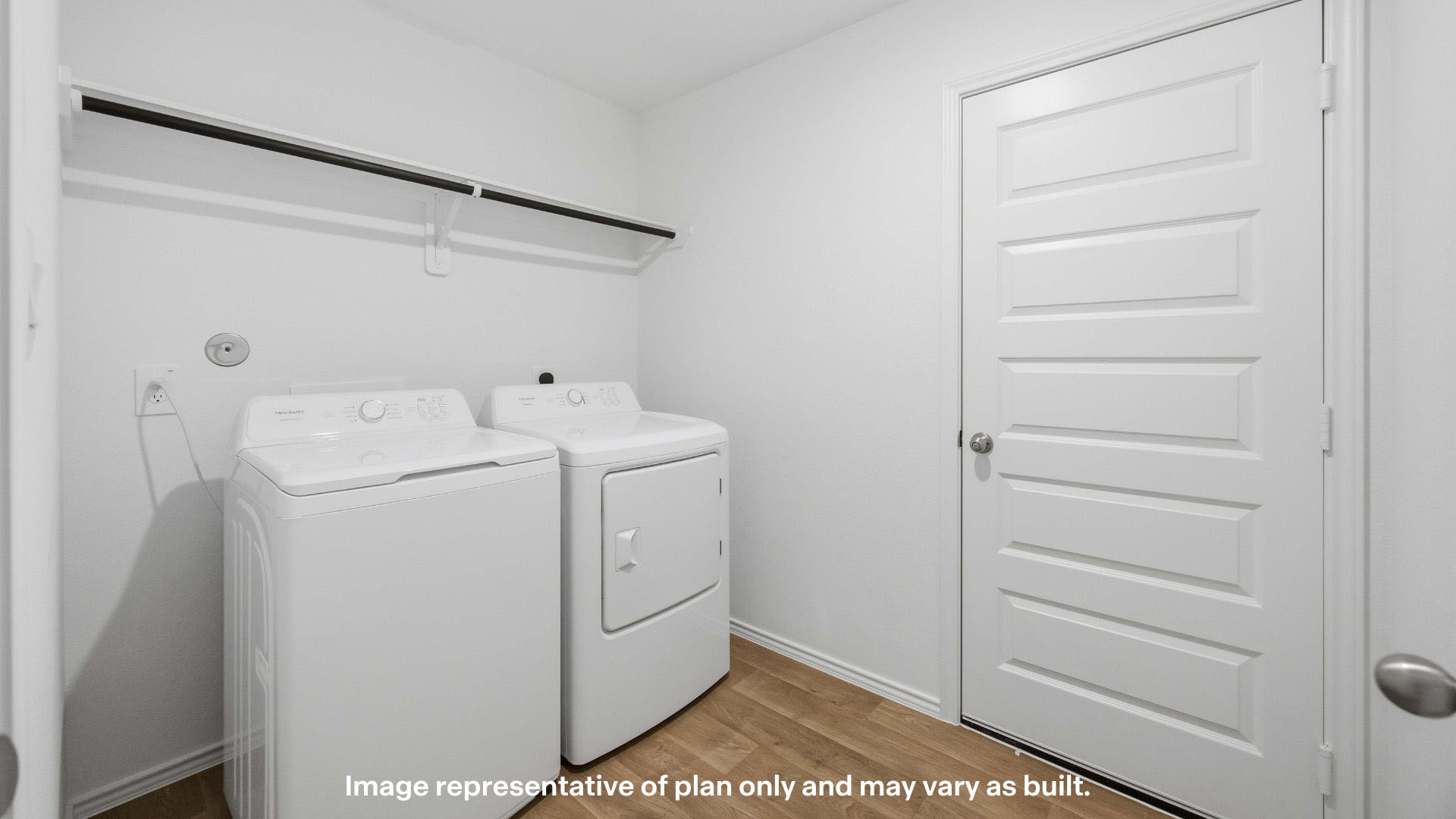 utility closet for washer and dryer hookups, extra storage space shelf above.
