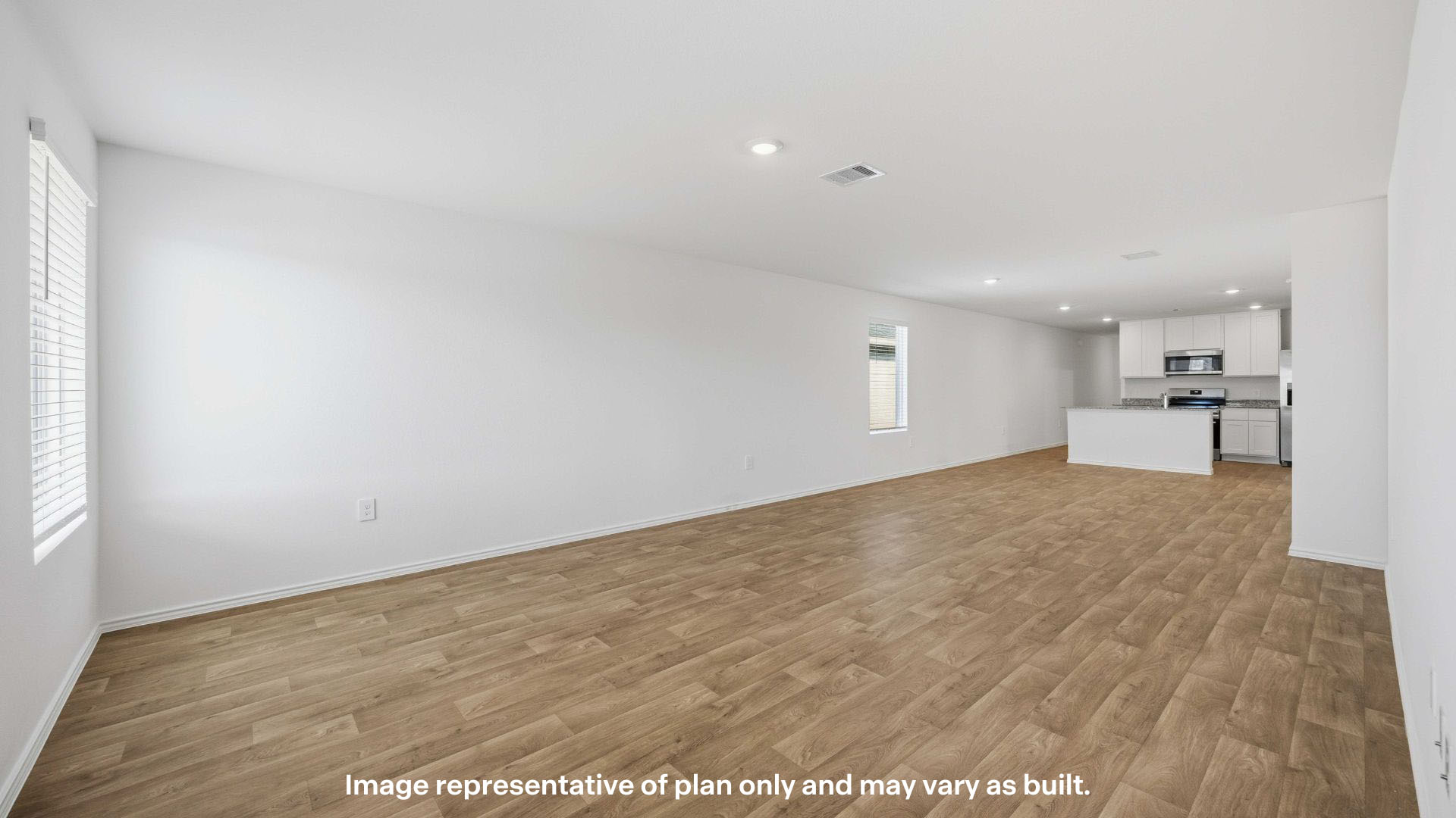 Open concept kitchen, living, family, and dining room space