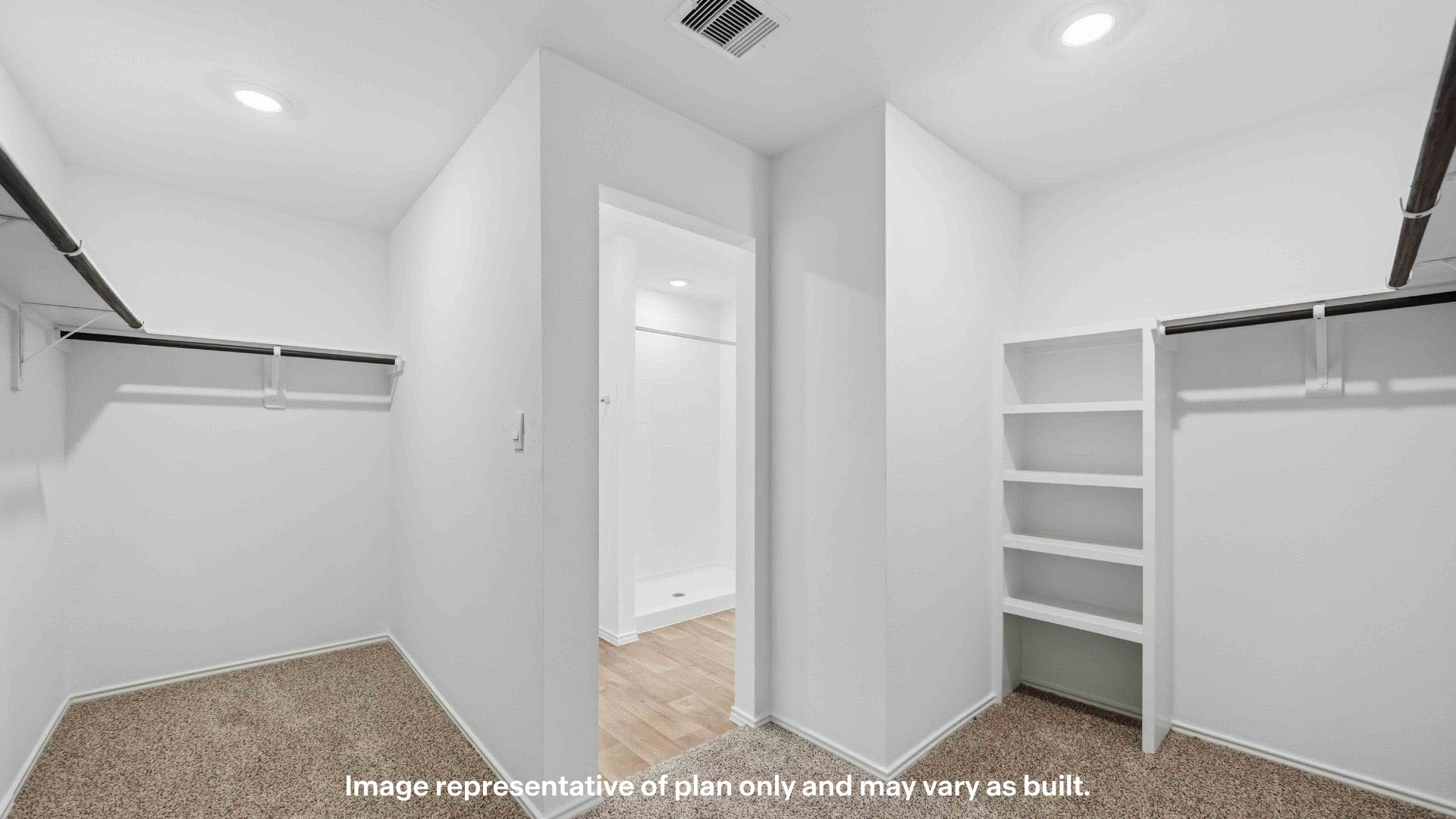 Primary walk-in closet with extra storage space