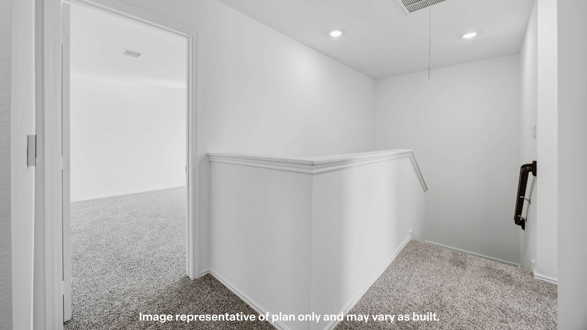 Upstairs landing space surrounded by bedrooms and laundry room