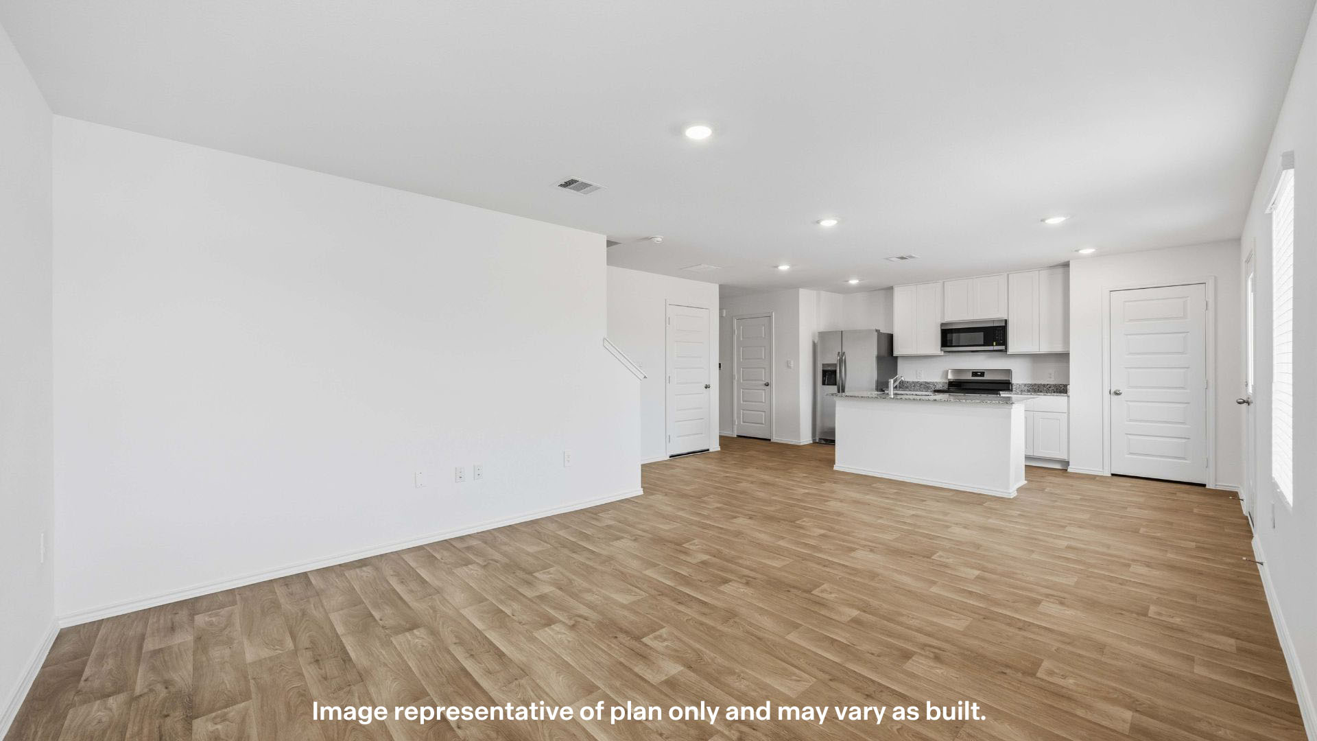 Open concept kitchen, living, family, and dining room space