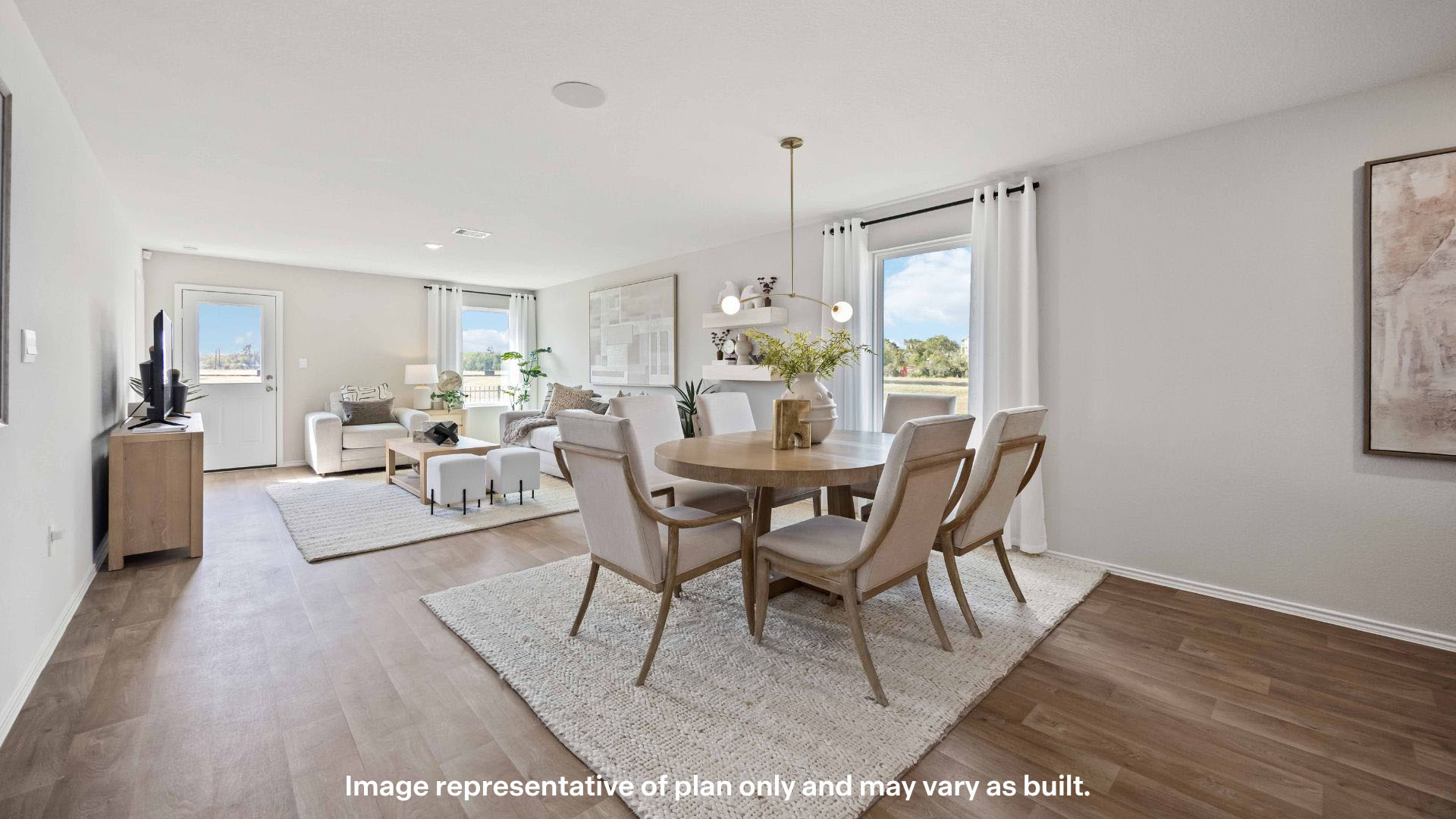 Open concept kitchen, living, family, and dining room space