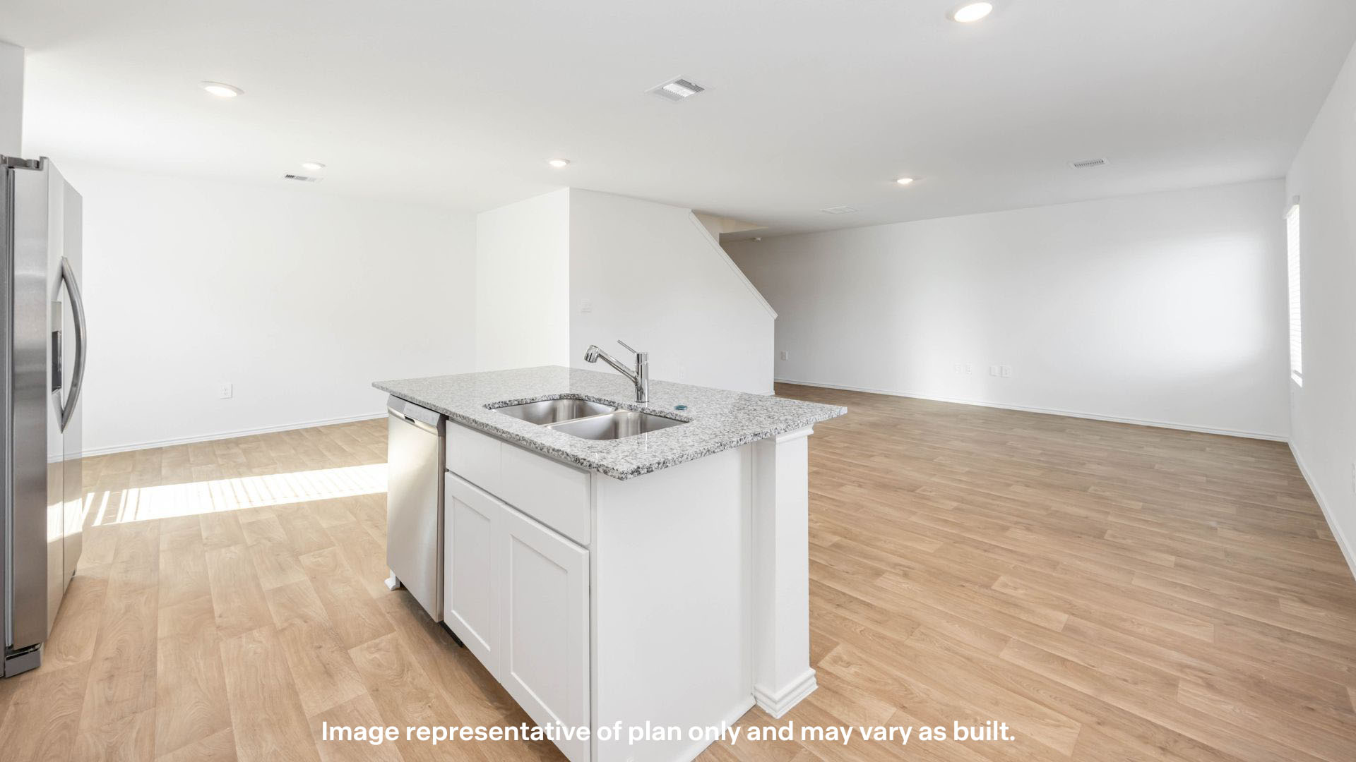 Open concept kitchen, living, family, and dining room space