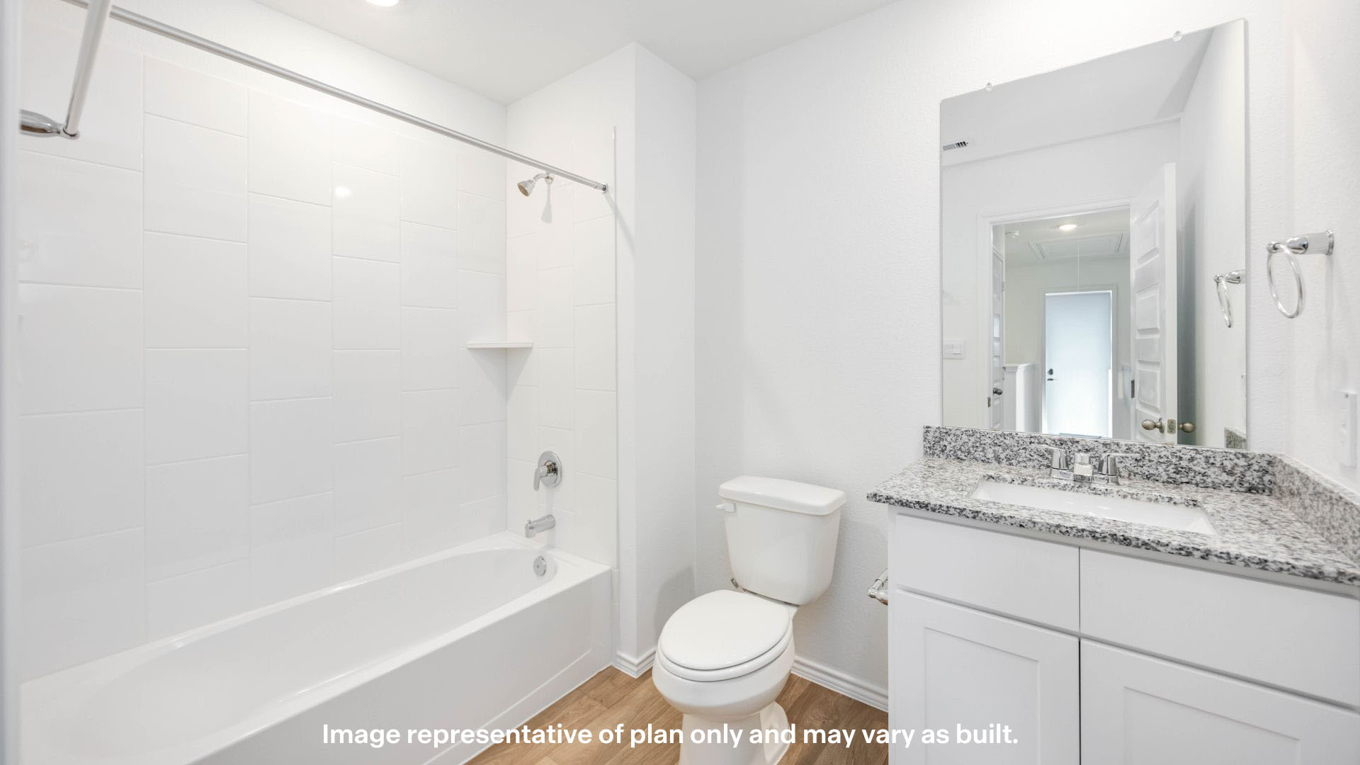 Guest bathroom with built in vanity and combination bathtub shower