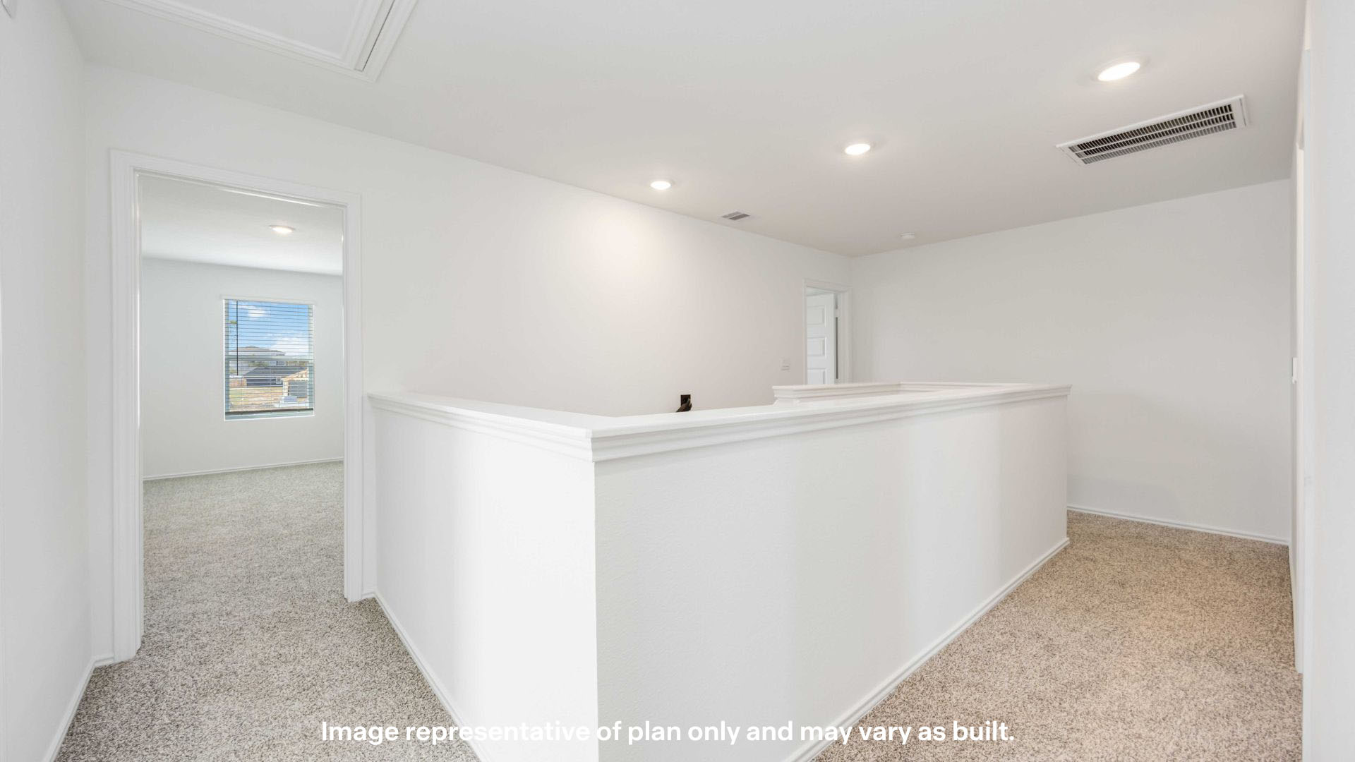 upstairs landing space surrounded by bedrooms and laundry room