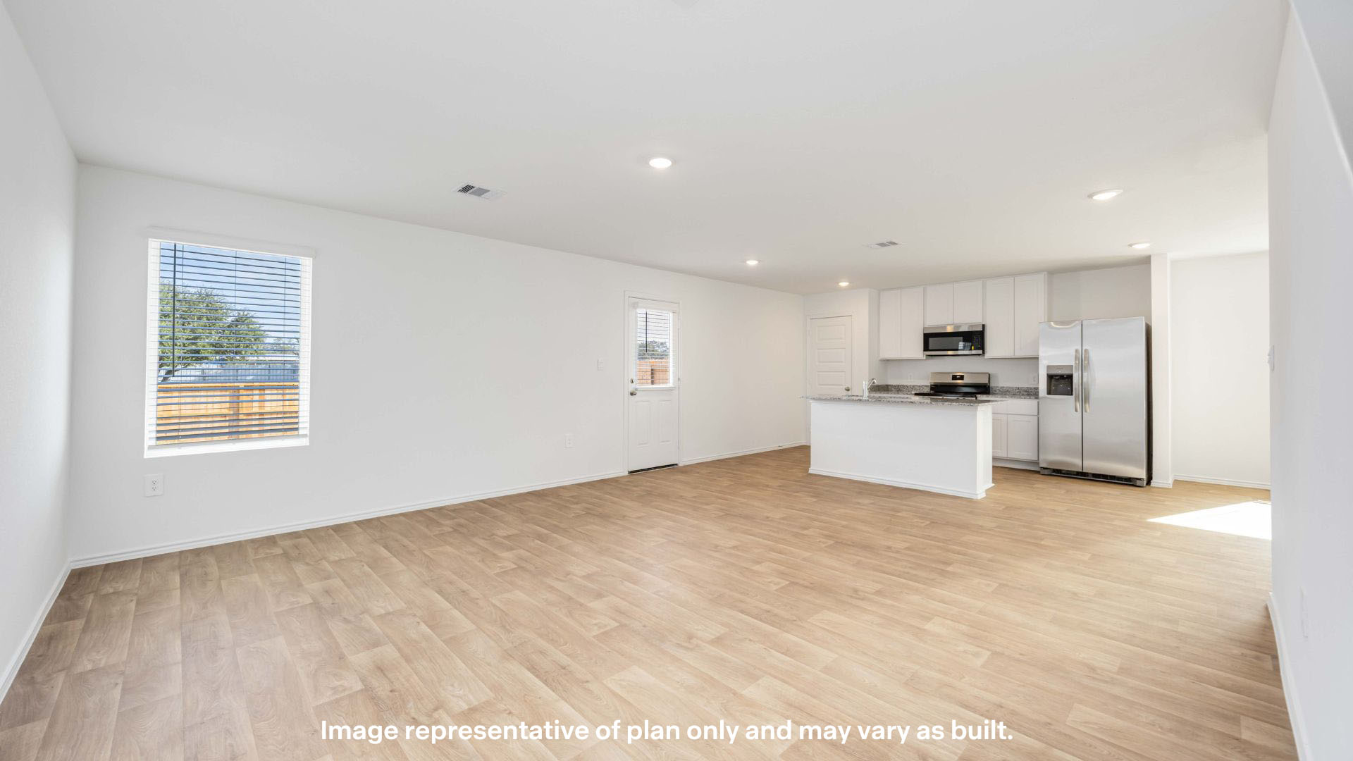 Open concept kitchen, living, family, and dining room space