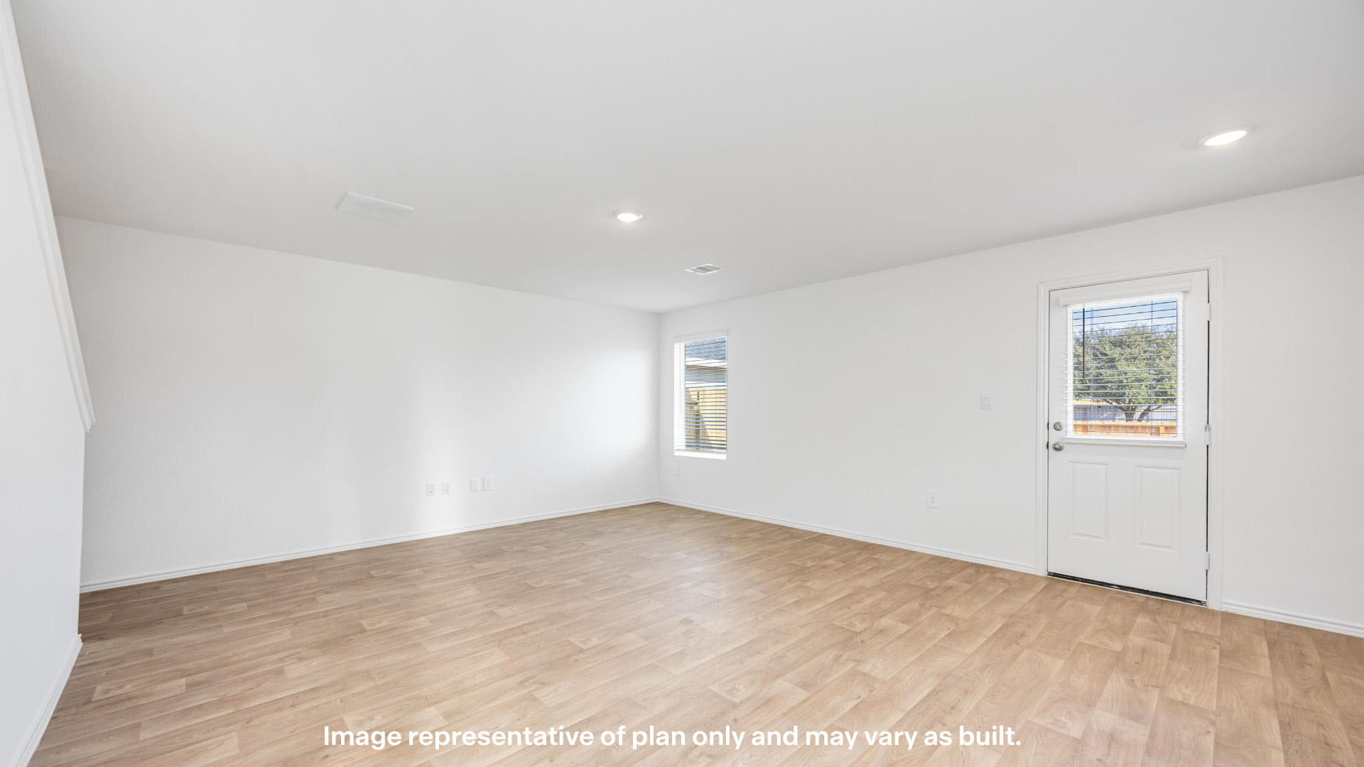 Open living and family room area with ample natural light