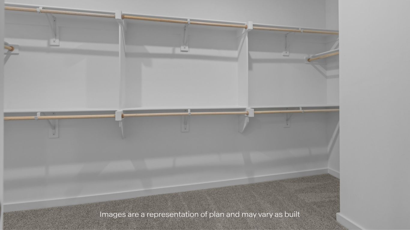 Primary walk-in closet with extra storage space