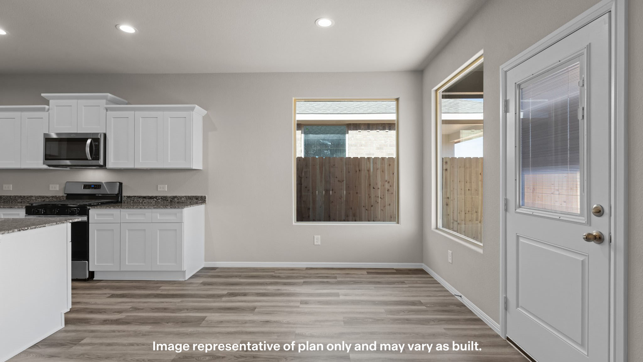 Open dining room space adjacent to kitchen