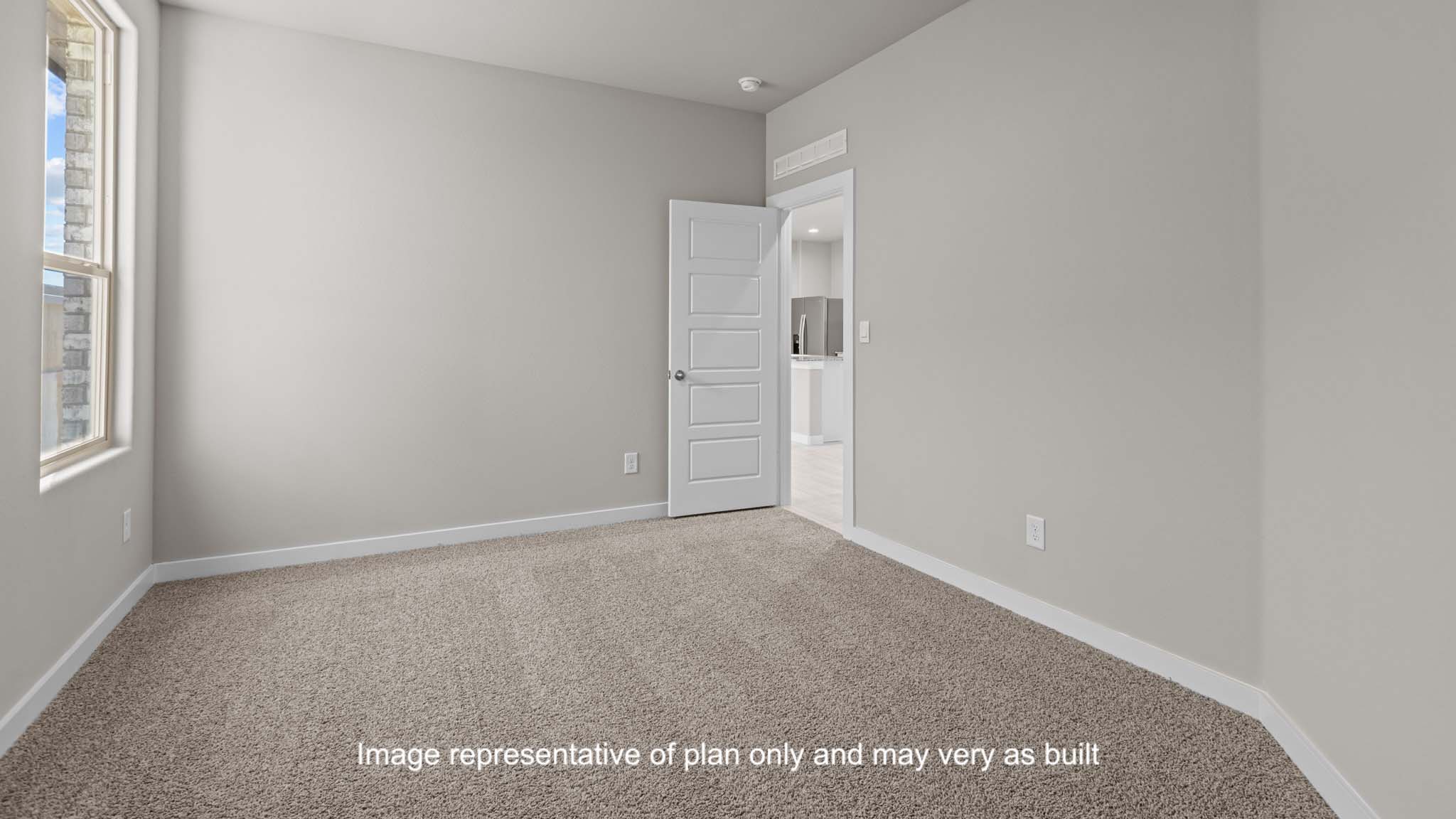 Guest bedroom 5 with plush carpet and side window