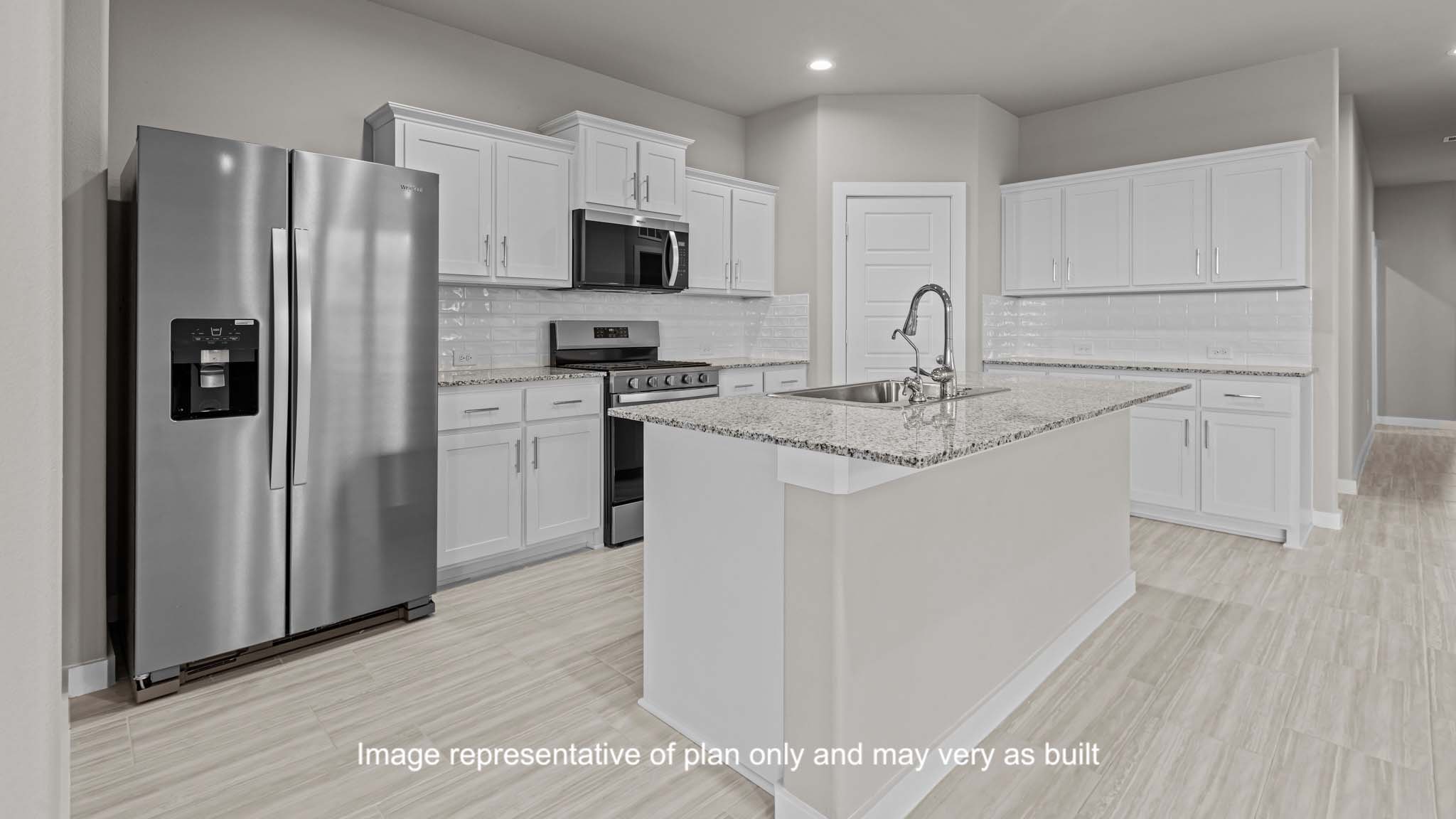 Open concept kitchen with stainless steel appliances, shaker style cabinets, and elevated finishes