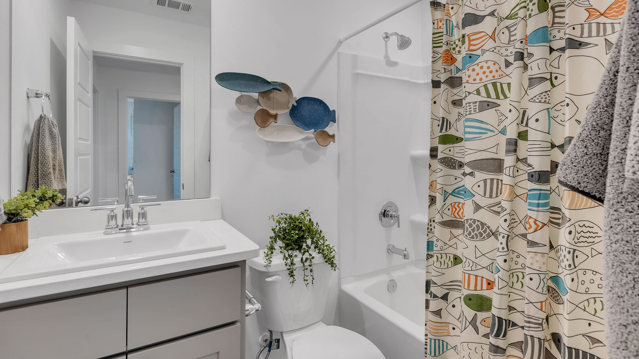Upstairs guest bathroom located between guest bedrooms