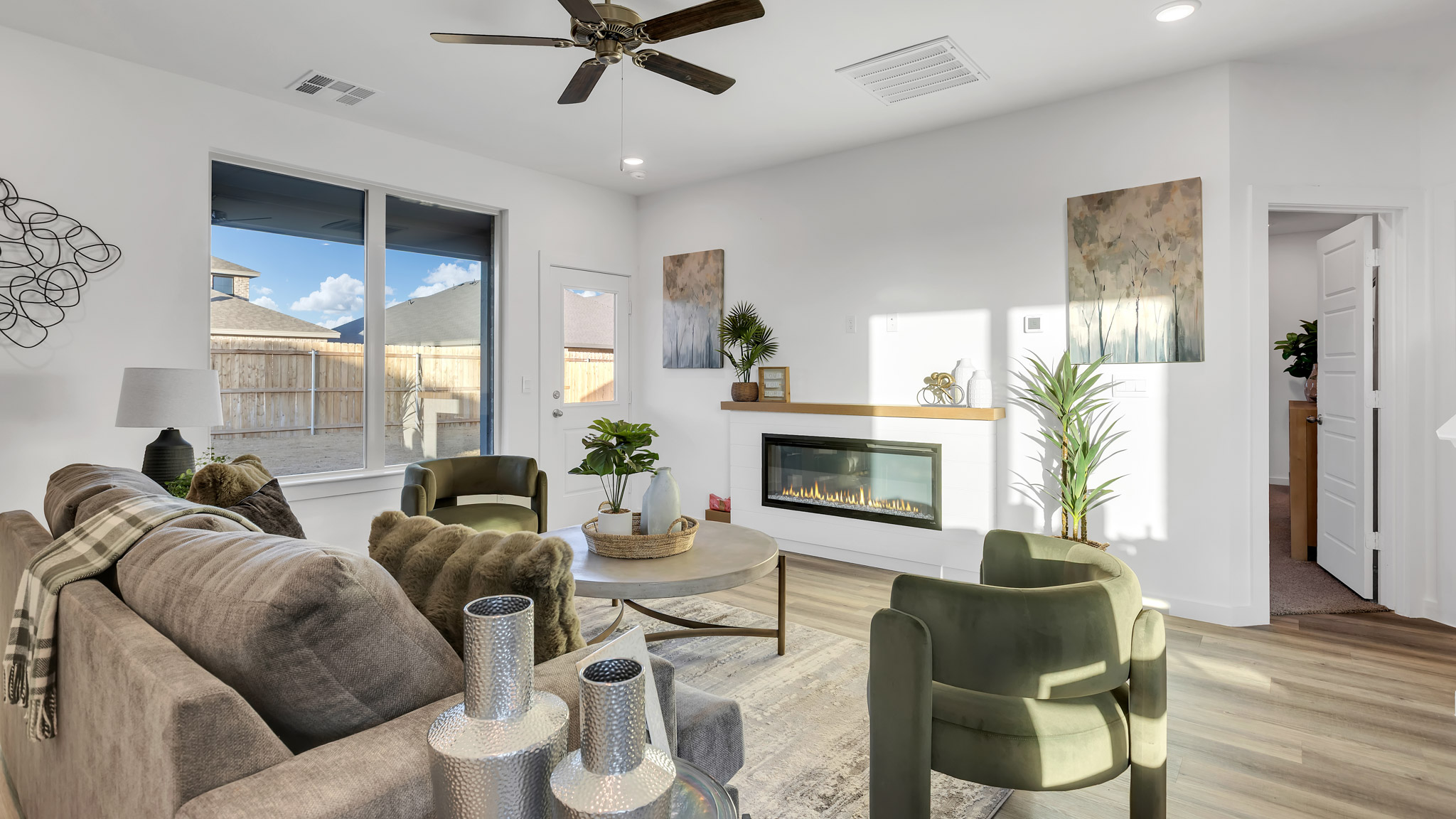 Open living and family room area with ample natural light