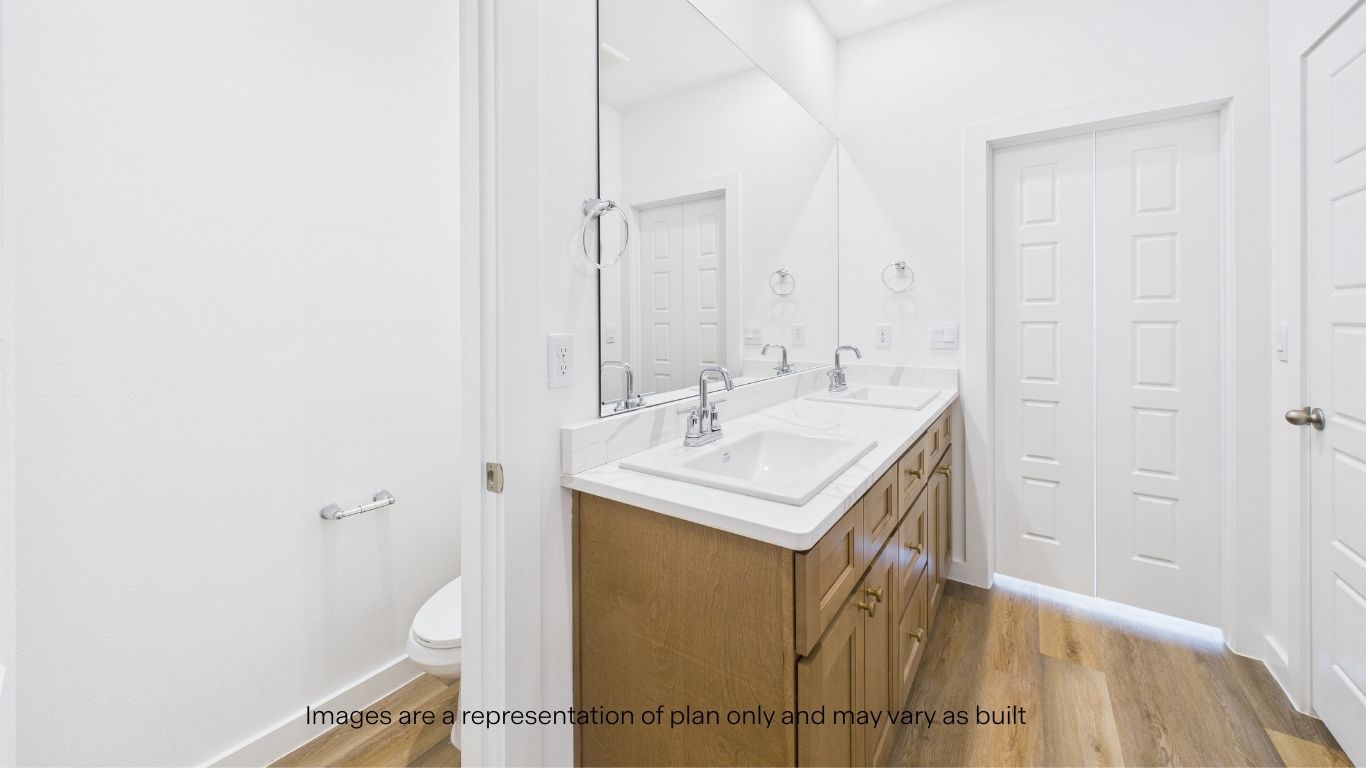 Primary bathroom with private water closet and walk-in closet