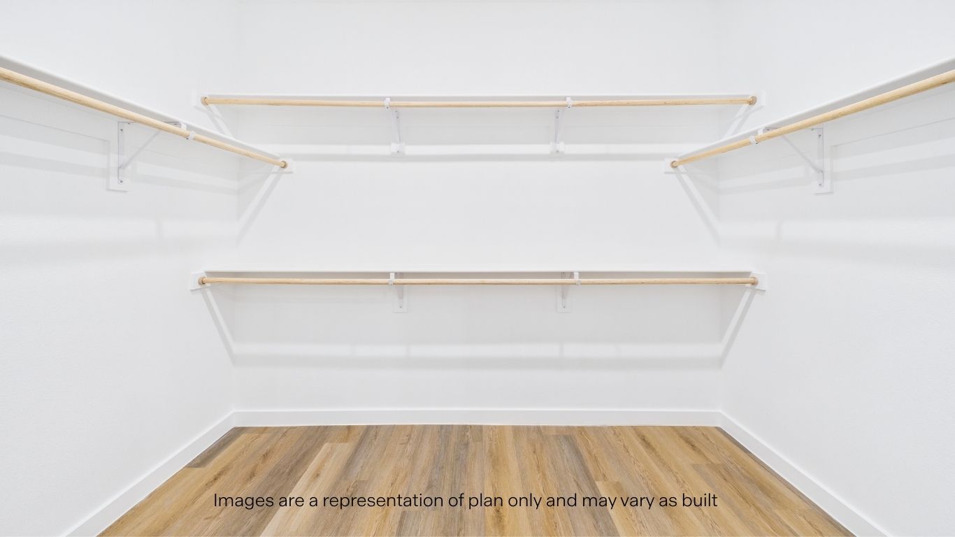 Primary walk-in closet with extra storage space