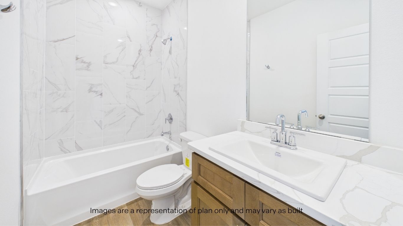 Upstairs guest bathroom located between rooms