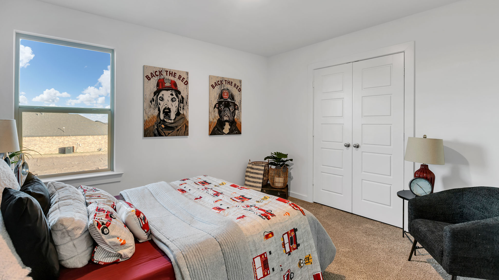 Guest bedroom 2 with side window and plush carpet floor