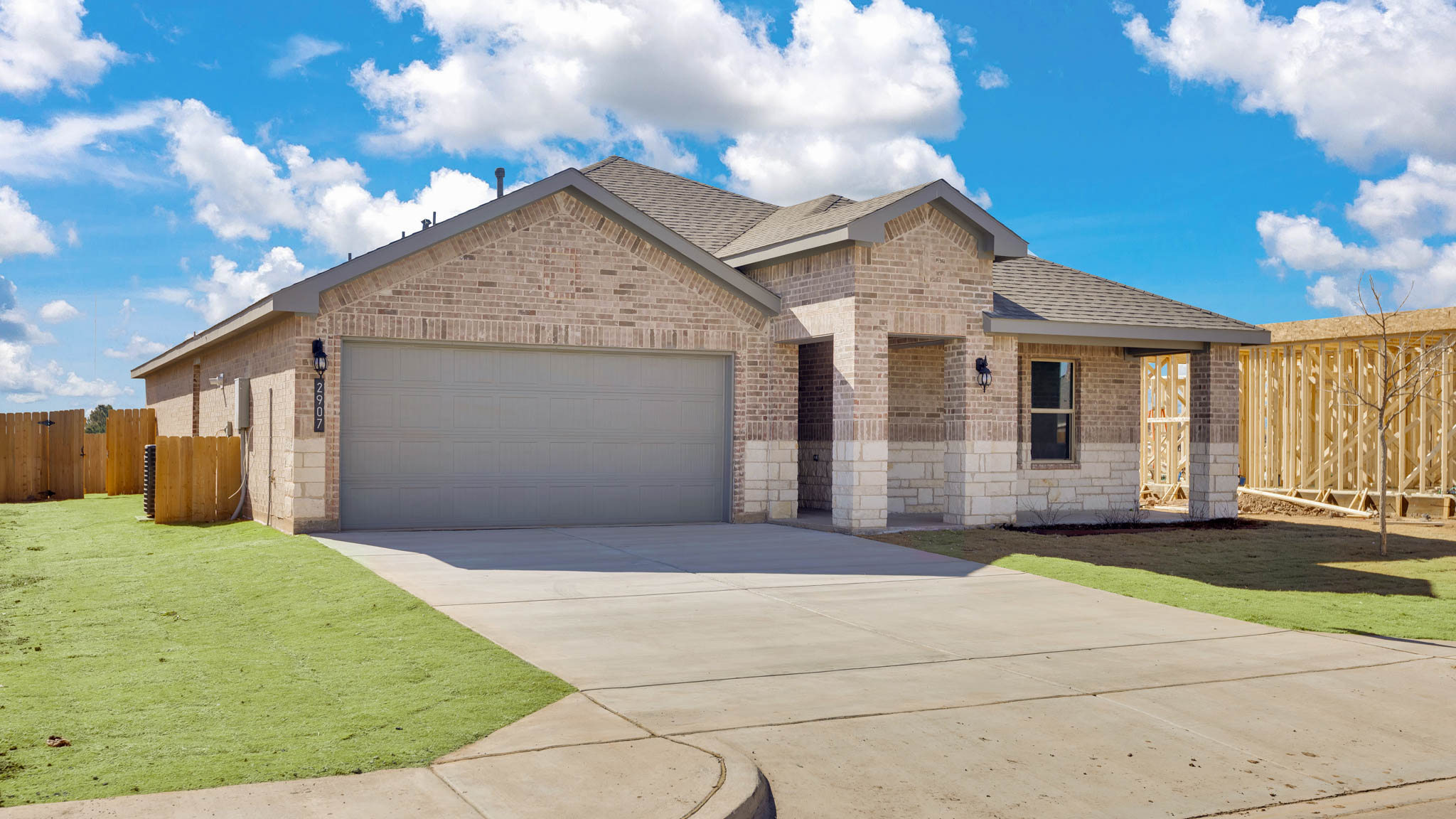 Side view of single story timeless brick home