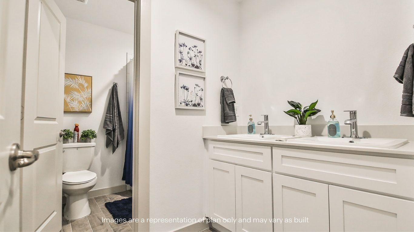 Guest bathroom located between guest bedrooms