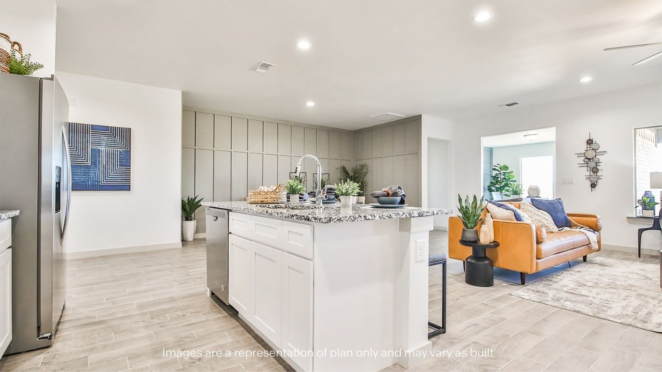 Open concept kitchen, living, family, and dining room space