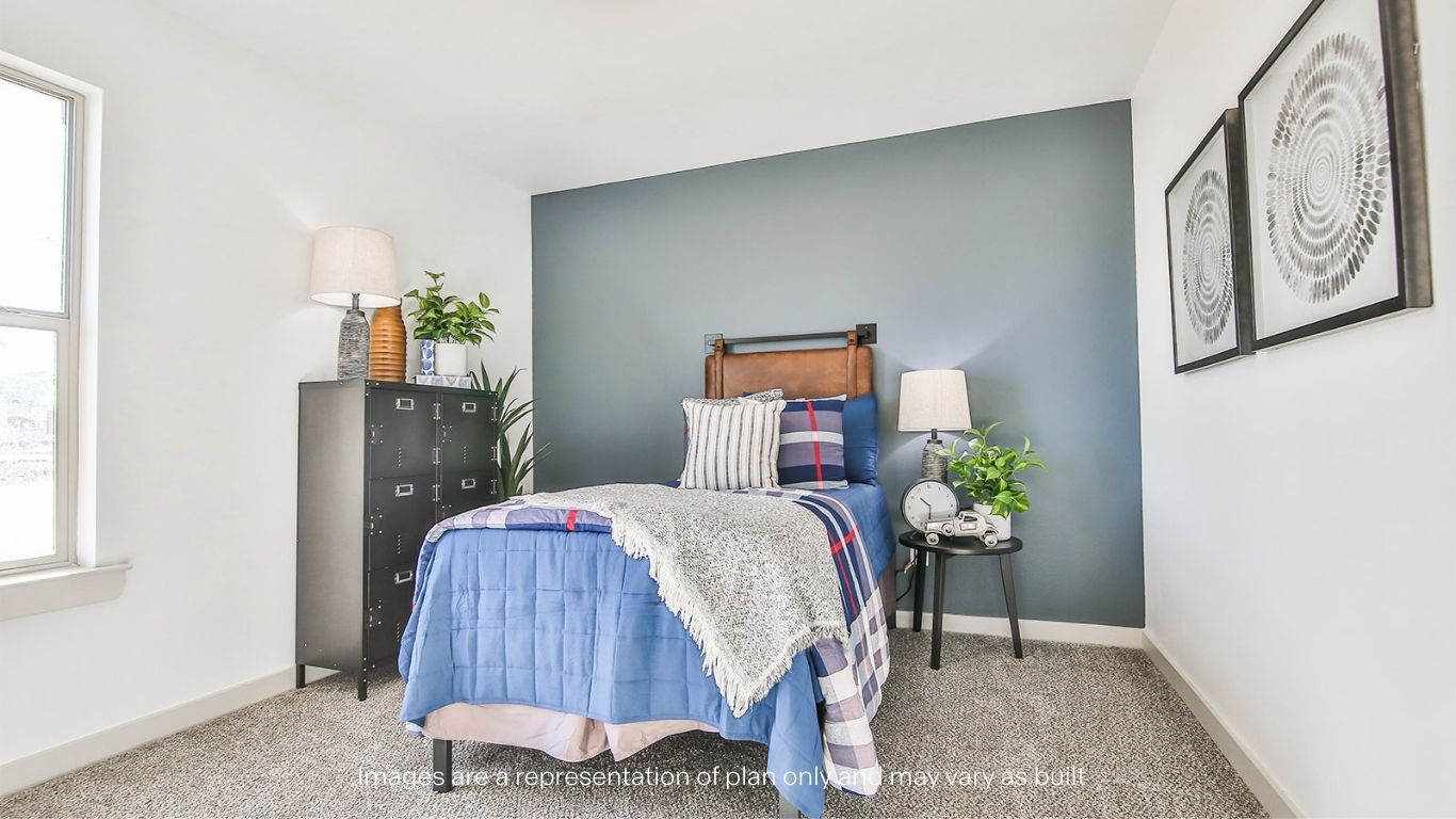 Guest bedroom 3 with side window and plush carpet floor