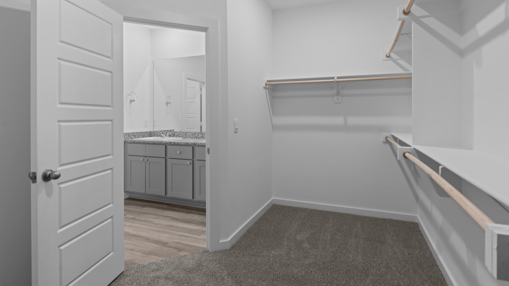 Primary walk-in closet with extra storage space