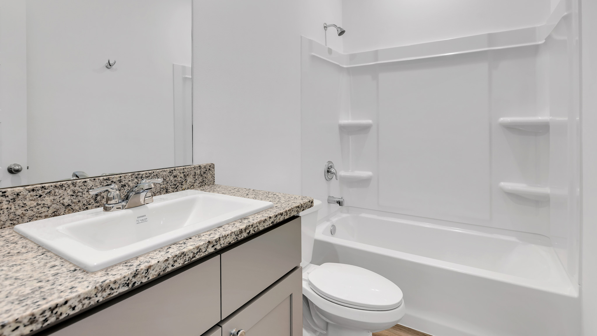 Guest bathroom located between common rooms