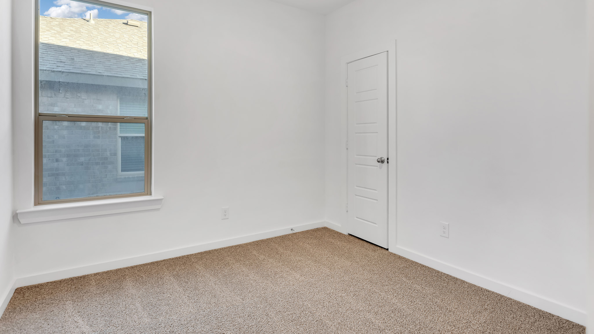 Bedroom 2 with side window and spacious closet