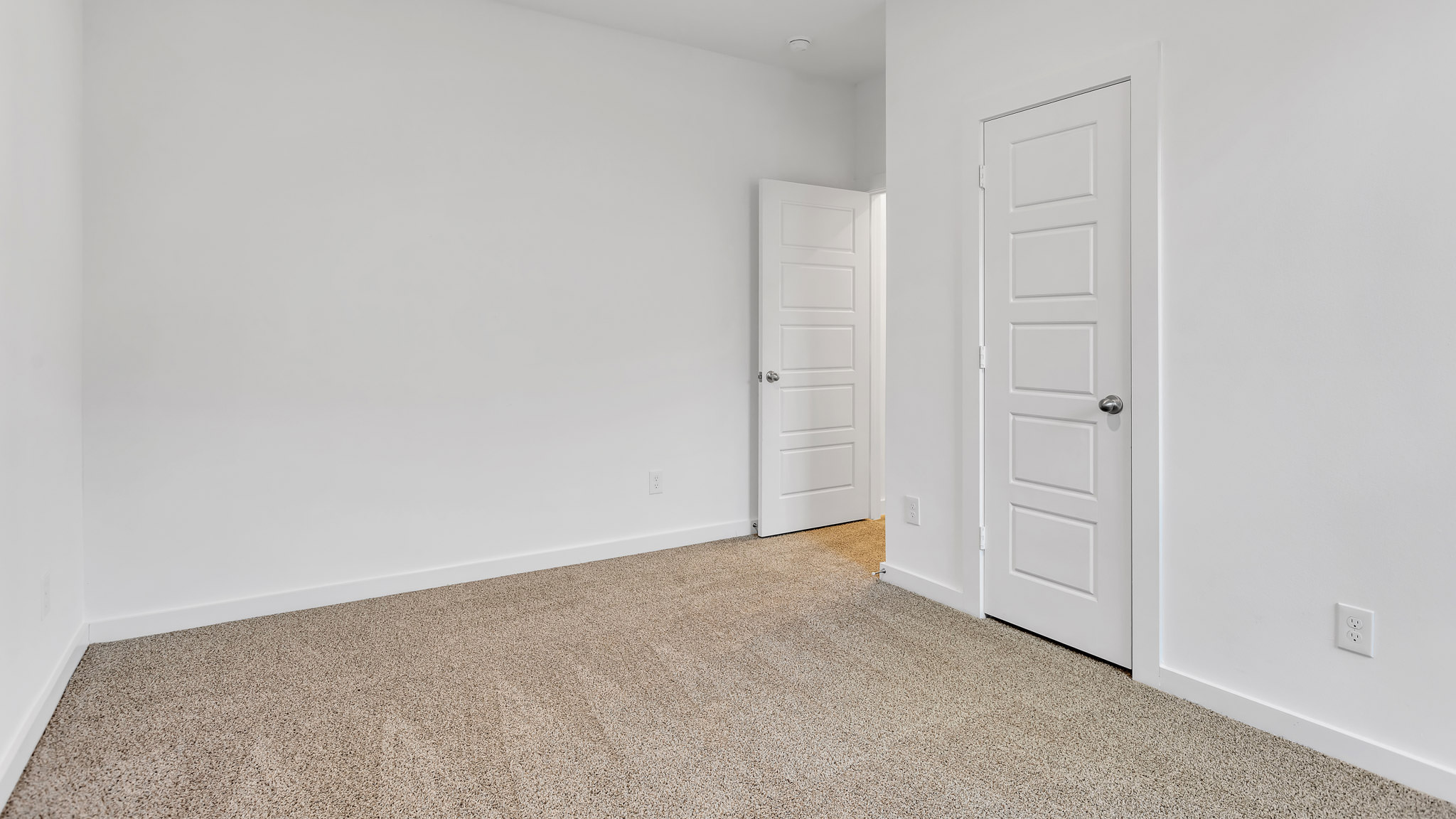 Bedroom 3 with spacious closet and plush carpet floors