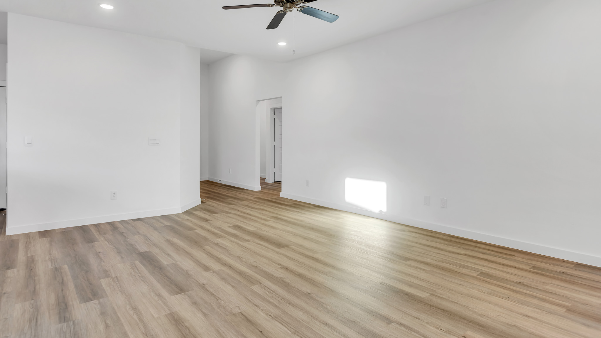 Spacious living and family room with ample lighting