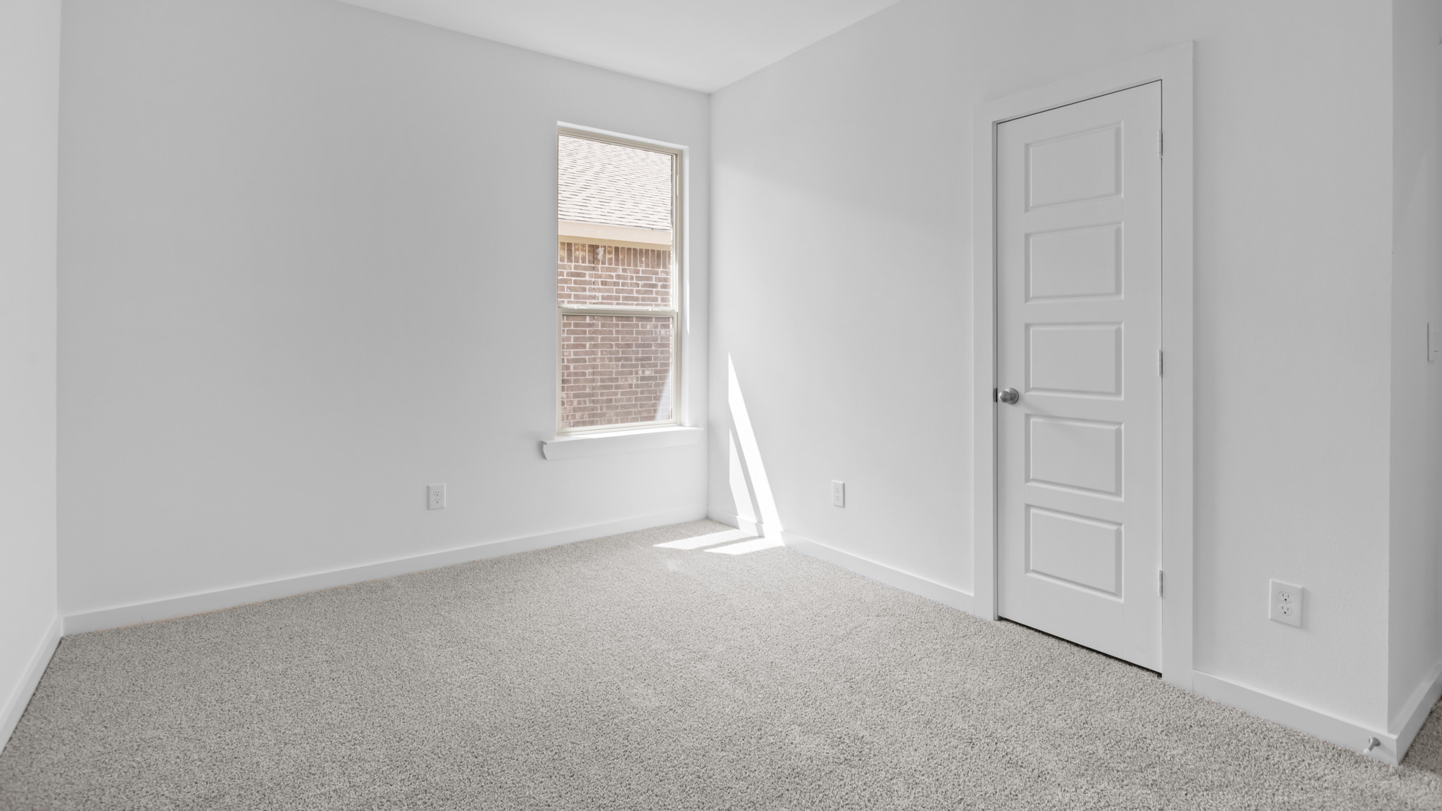 Guest bedroom 3 with plush carpet floors and spacious closet