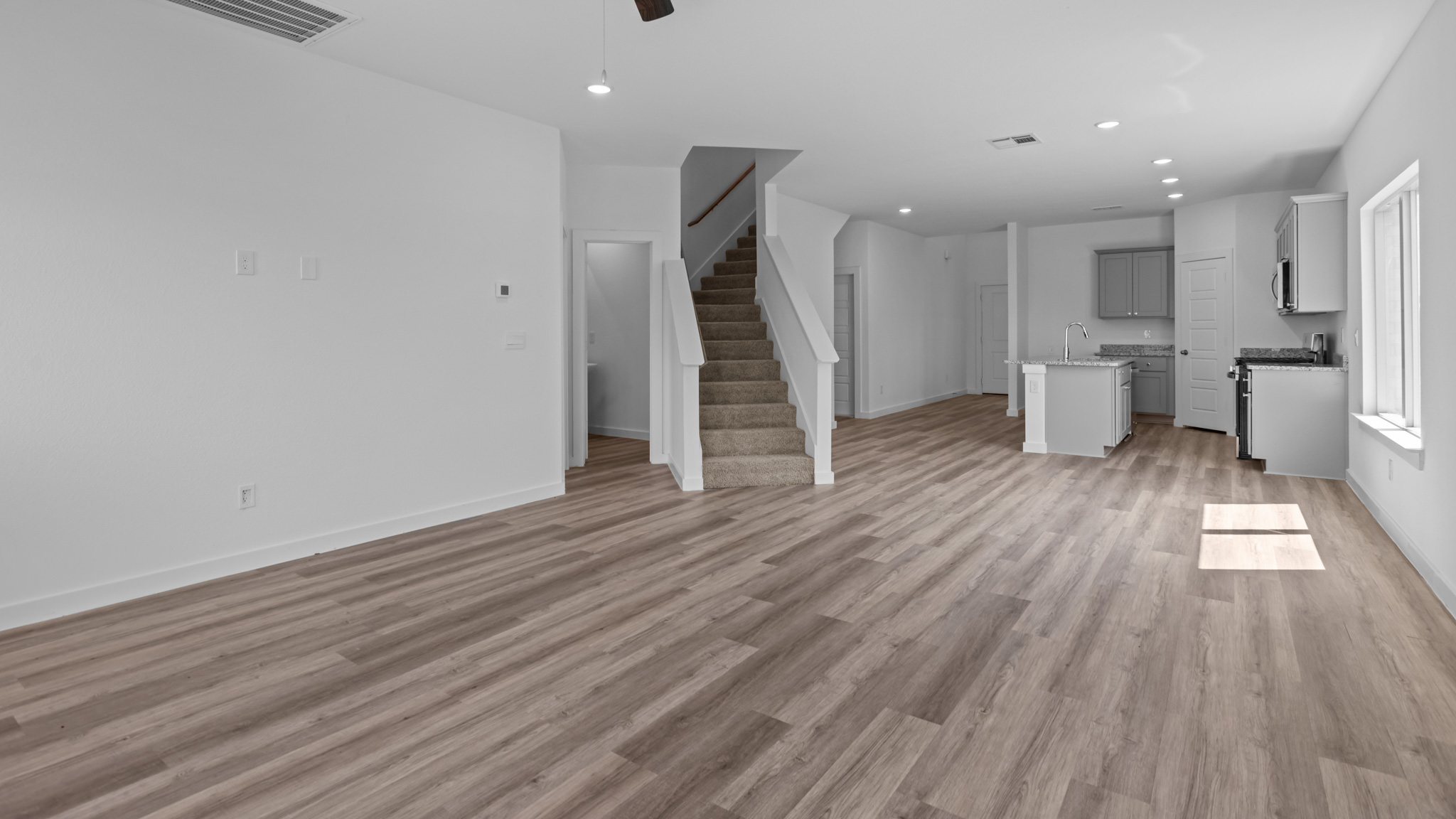 Open concept living, family, dining, and kitchen space