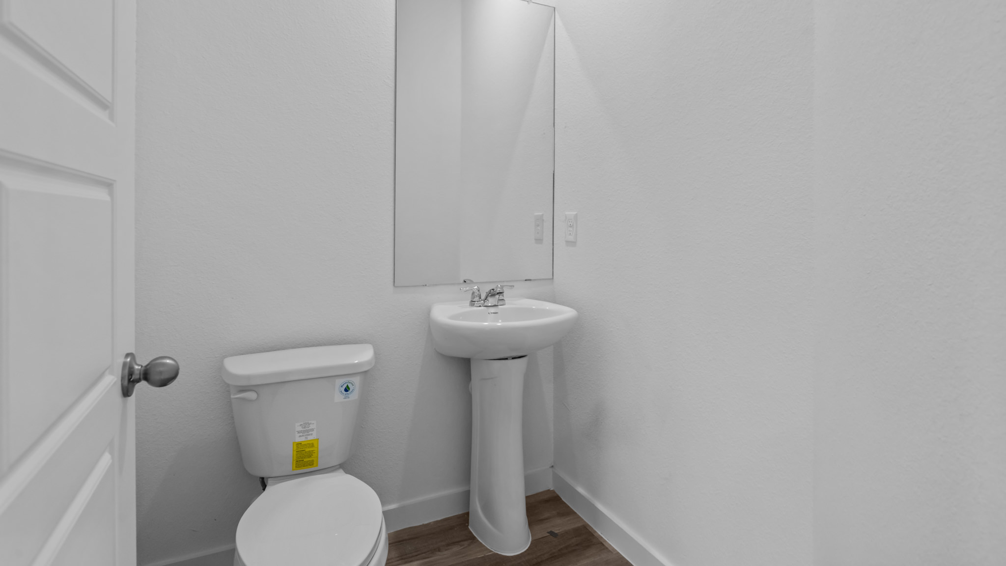 Half bathroom between common spaces