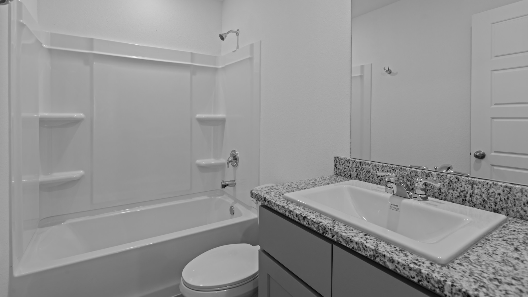 Guest bathroom located between guest bedrooms
