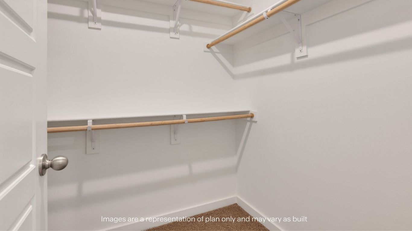Primary walk-in closet with extra storage space