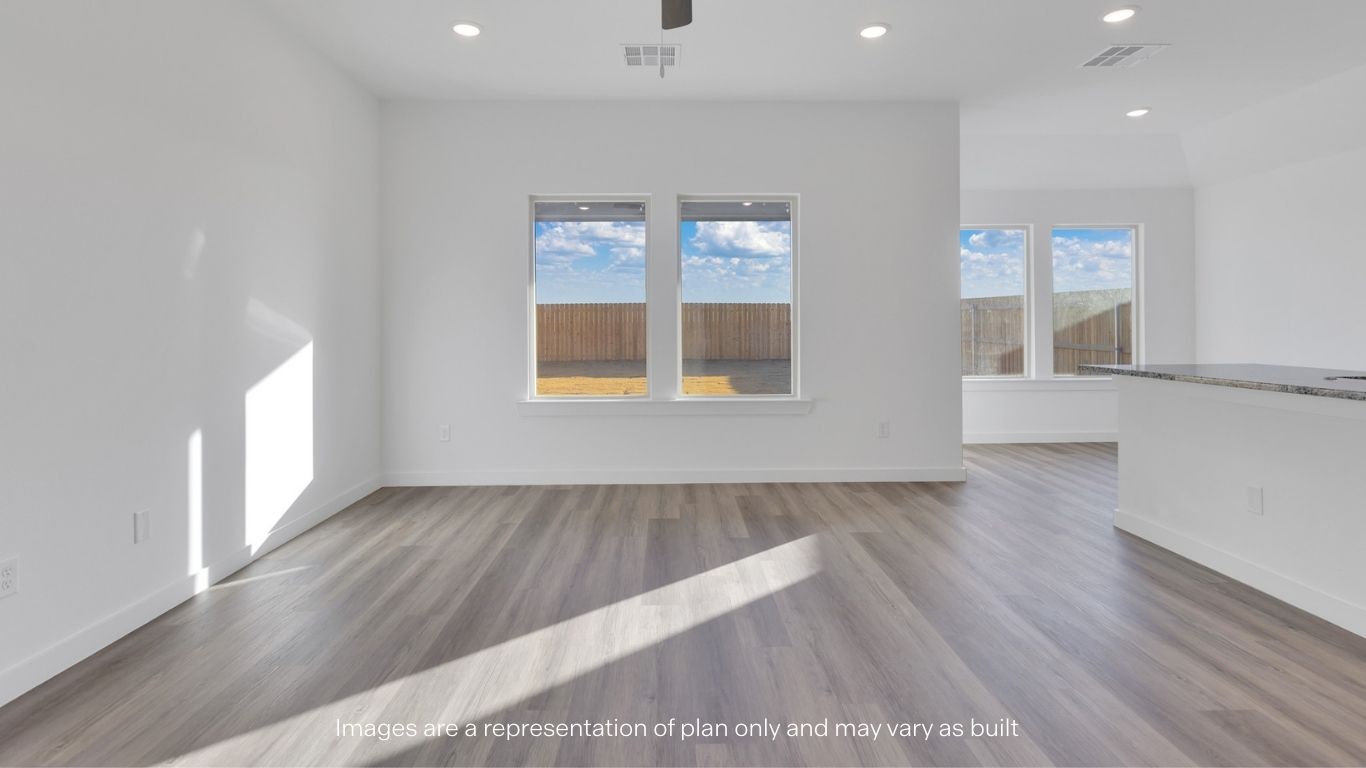 Open concept kitchen, living, family, and dining room space