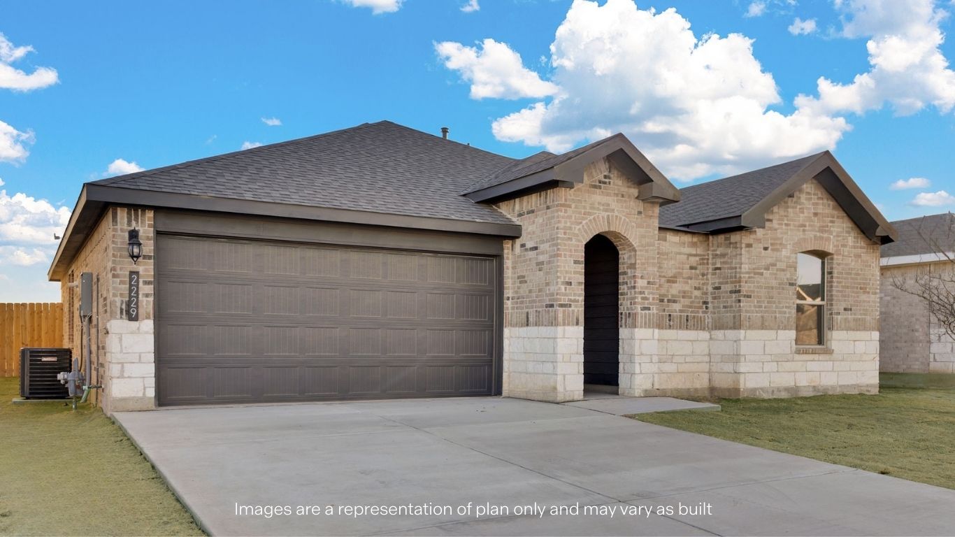 Side view of single story timeless brick home