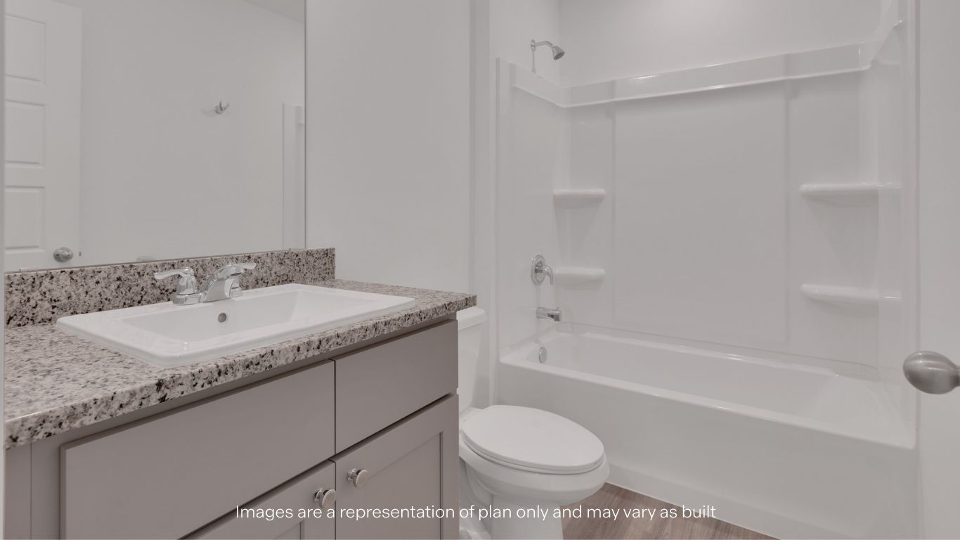 Guest bathroom located between guest bedrooms