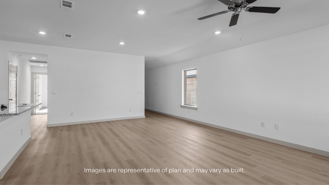 Open living and family room area with ample natural light