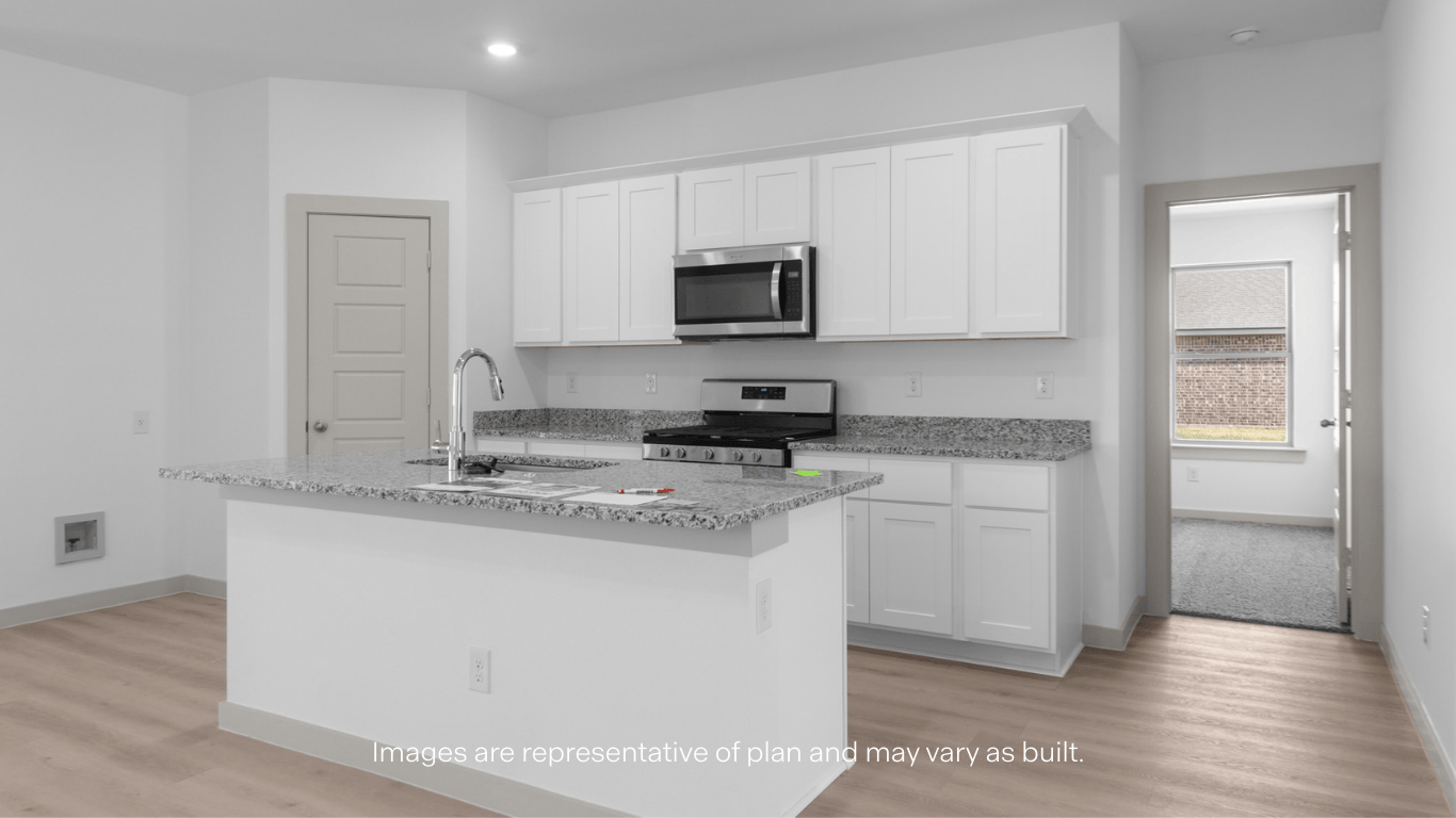 Spacious open concept kitchen with island and counter prep space